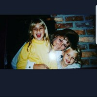 Brandon Flynn with sister and mother