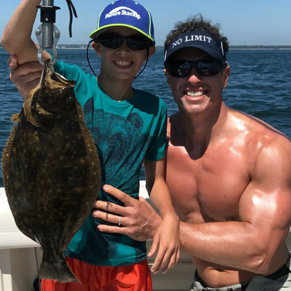 Chris Cuomo fishing with son (+ abs & biceps) .