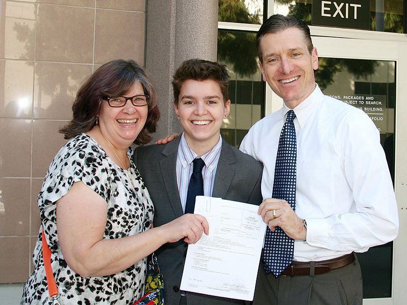 Elliot Fletcher with parents: Father-John DeMita, Mother- Julia Fletcher.