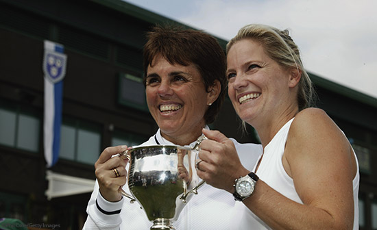 Ilana Kloss, with a women's doubles title cup
