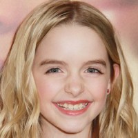 Mckenna Grace in her curly blond hair