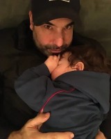 Rick Hoffman with his son