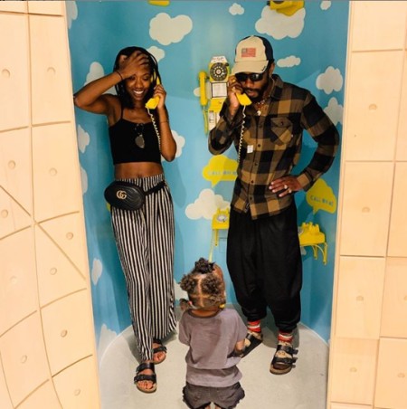 Xosha Roquemore & Lakeith Stanfield with their daughter