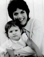 Young Nancy Dow with baby Jennifer